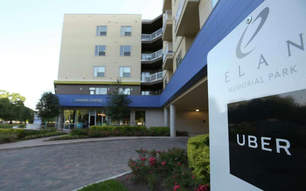 An Uber pick-up/drop-off sign outside the Elan Memorial Park apartment complex on Westcott Street Tuesday, May 16, 2017, in Houston. Houston's Greystar Properties has partnered with Uber to put dedicated pick-up and drop-off points at its residential properties. The app will direct both the driver and the passenger to the dedicated spots. ( Godofredo A. Vasquez / Houston Chronicle )