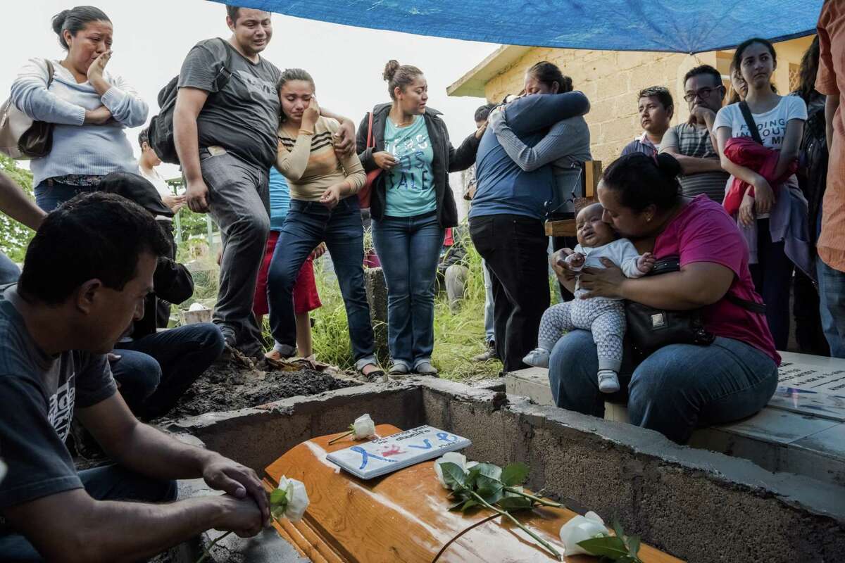 Pedro Tamayo Rosas Alicia Blanco Beisa, wife of Pedro Tamayo Rosas, a crime reporter who was murdered, holds their 5-month-old grandson at his funeral in Tierra Blanca, Veracruz, Mexico, July 22, 2017. The Mexican state of Veracruz is the most dangerous place to be a reporter in the Western Hemisphere.