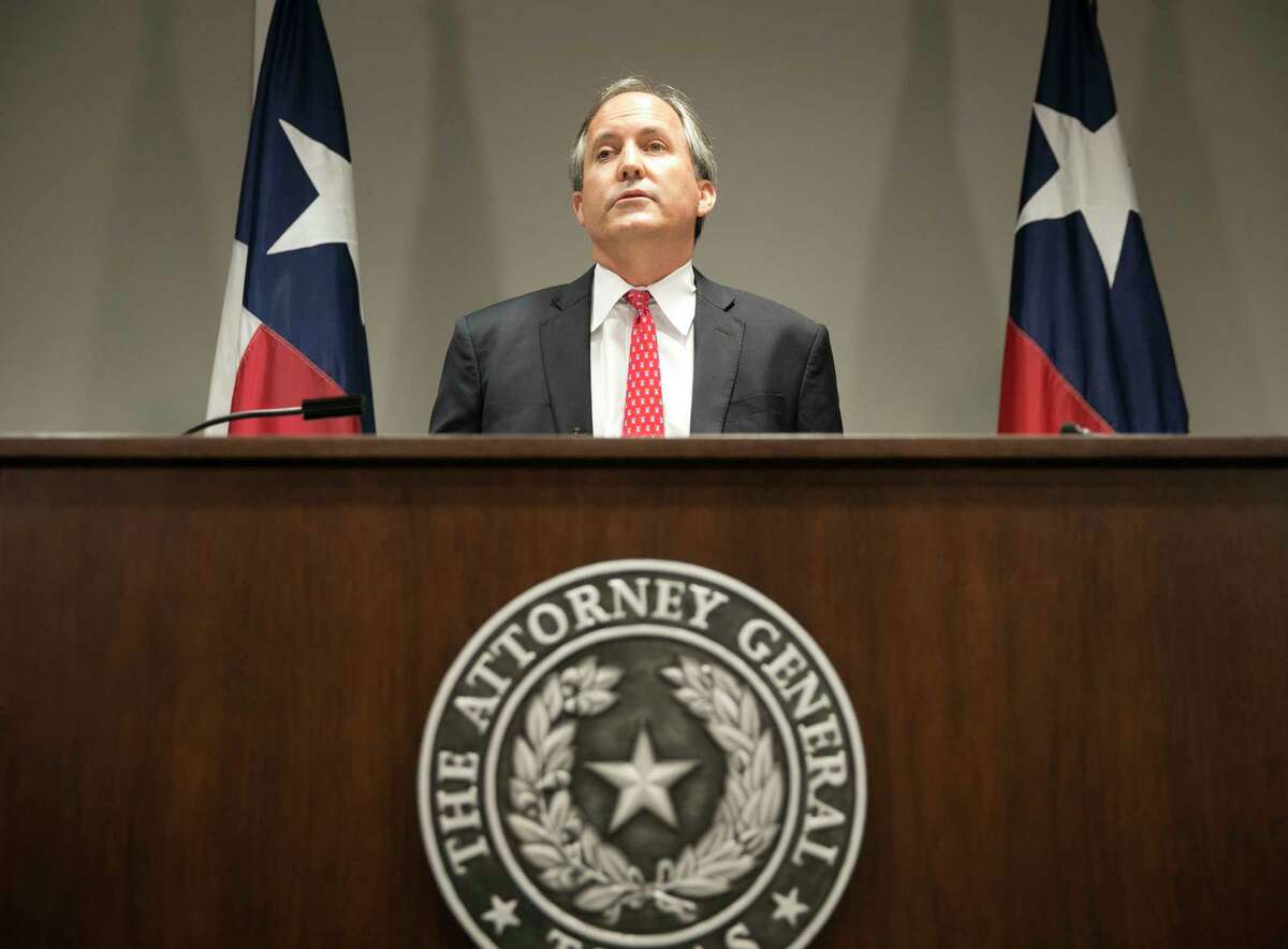 FILE - In this May 25, 2016 file photo, Republican Texas Attorney General Ken Paxton announces Texas' lawsuit to challenge President Obama's transgender bathroom order during a news conference in Austin, Texas. In Texas, reporters seeking public documents and data are increasingly running into a road block: the state attorney general's office. The agency is the arbiter of the state's open records laws, yet in recent years has been flooded with requests from governments at all levels seeking to withhold information. The agency almost always allows them to do so. (Jay Janner/Austin American-Statesman via AP)