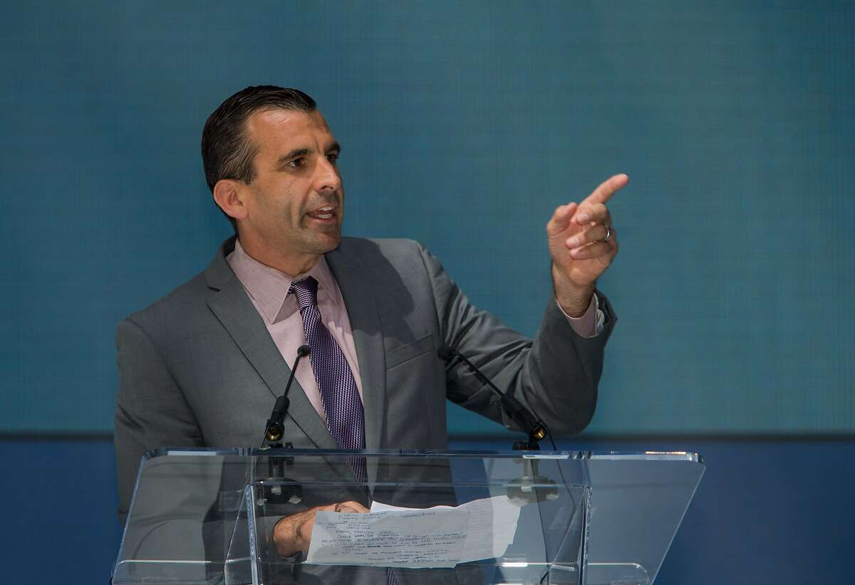 FILE-- San Jose Mayor Sam Liccardo addresses the crowd at Samsung's opening ceremonies of a new 1.1 million square foot research and development, sales and marketing center on Thursday, Sept. 24, 2015 in San Jose. Google is considering opening an enormous new office in San Jose, potentially bringing thousands of jobs there.