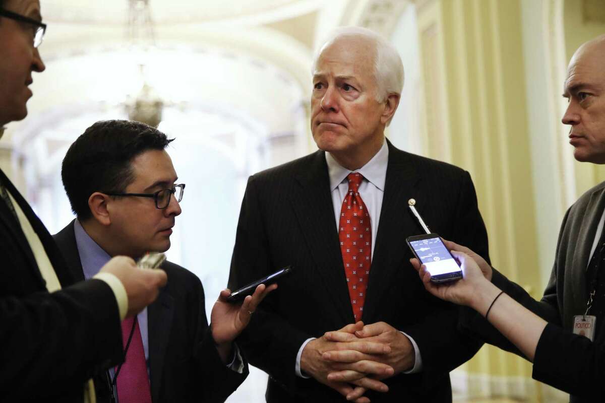 FILE - In this May 10, 2017 file photo, Senate Majority Whip John Cornyn of Texas talks with reporters on Capitol Hill in Washington. Cornyn has taken himself out of the running to be FBI director, telling the Trump administration that he?’ll stay in the Senate. (AP Photo/Jacquelyn Martin, File)