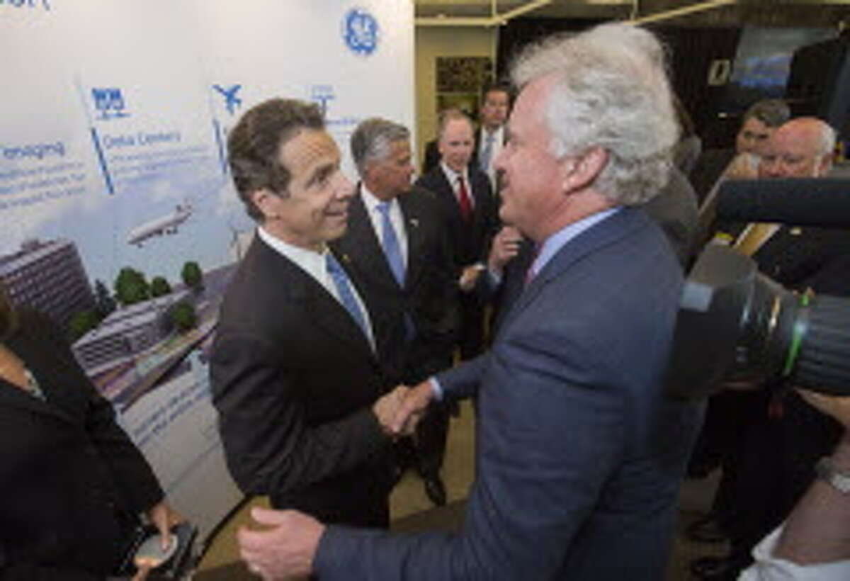 Gov. Andrew Cuomo, left, with General Electric Co. CEO Jeff Immelt during a July 2014 announcement of the $500 million Power Electronics Manufacturing Consortium that will operate a $35 million wafer fab line at SUNY Polytechnic Institute in Albany. Source: Governor's office