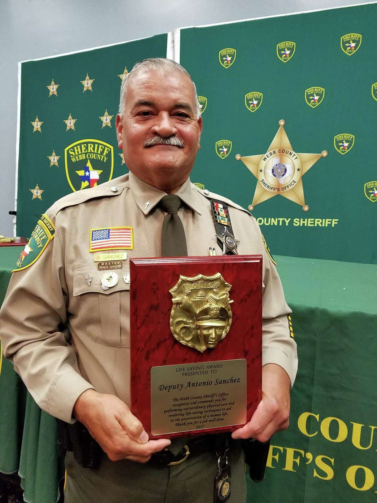Webb County Sheriff’s Office Deputy Antonio Sanchez was honored with a Life Saving Award. Sanchez jumped inside a moving vehicle and stopped it before injuring children.