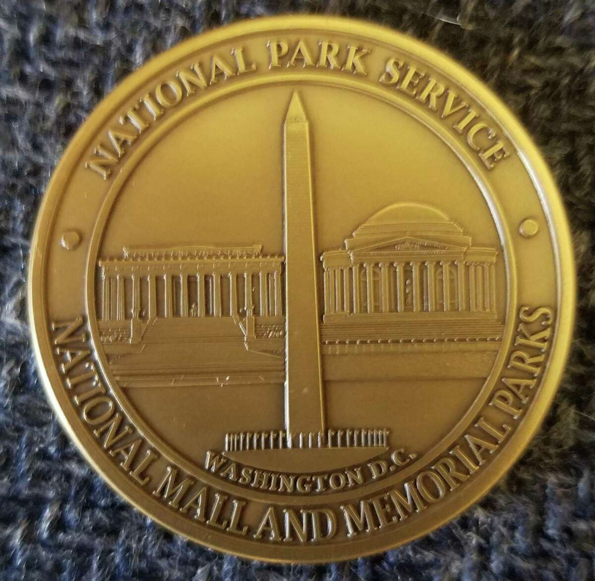 The youth group at Our Lady of Lakes in New Milford was presented this special, limited edition commemorative coin for their mission work in Washington, D.C. during a recent trip.