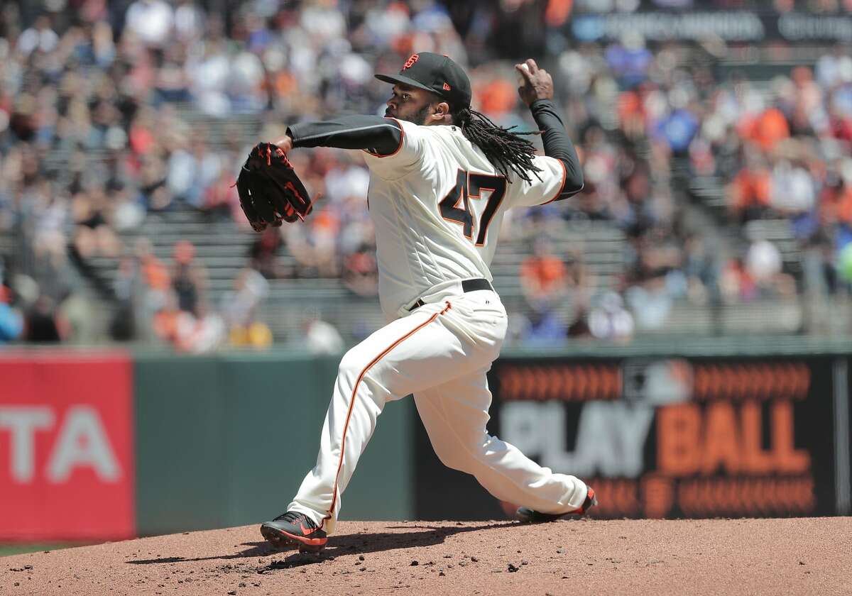 Giants' starting pitcher Johnny Cueto throws, as the San Francisco Giants take on the Los Angeles Dodgers in MLB action at AT&T Park in San Francisco, Ca. on Wednesday May 17, 2017.