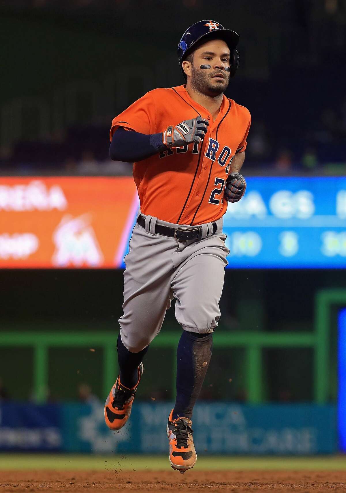 MIAMI, FL - MAY 17: Jose Altuve #27 of the Houston Astros hits a triple in the third inning during a game against the Miami Marlins at Marlins Park on May 17, 2017 in Miami, Florida. (Photo by Mike Ehrmann/Getty Images)