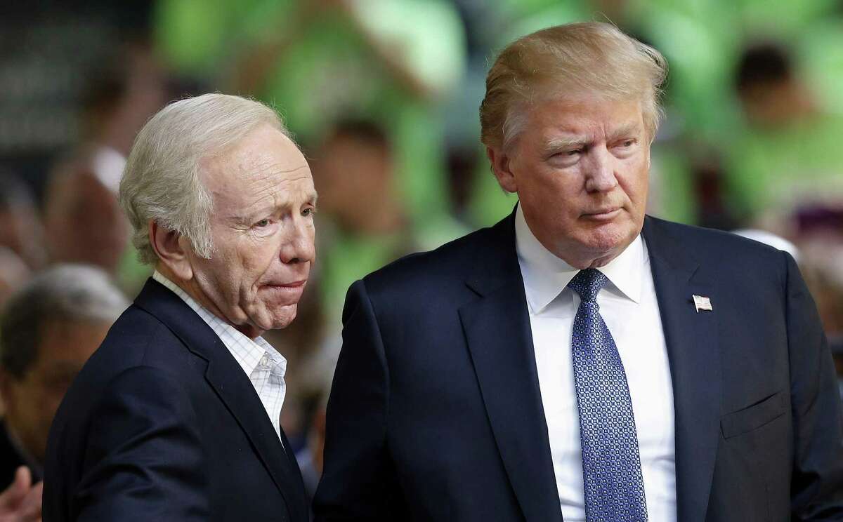 Former Connecticut Sen. Joe Lieberman introduces then-Republican presidential candidate Donald Trump at a No Labels Problem Solver convention in Manchester, N.H. in 2015. 
