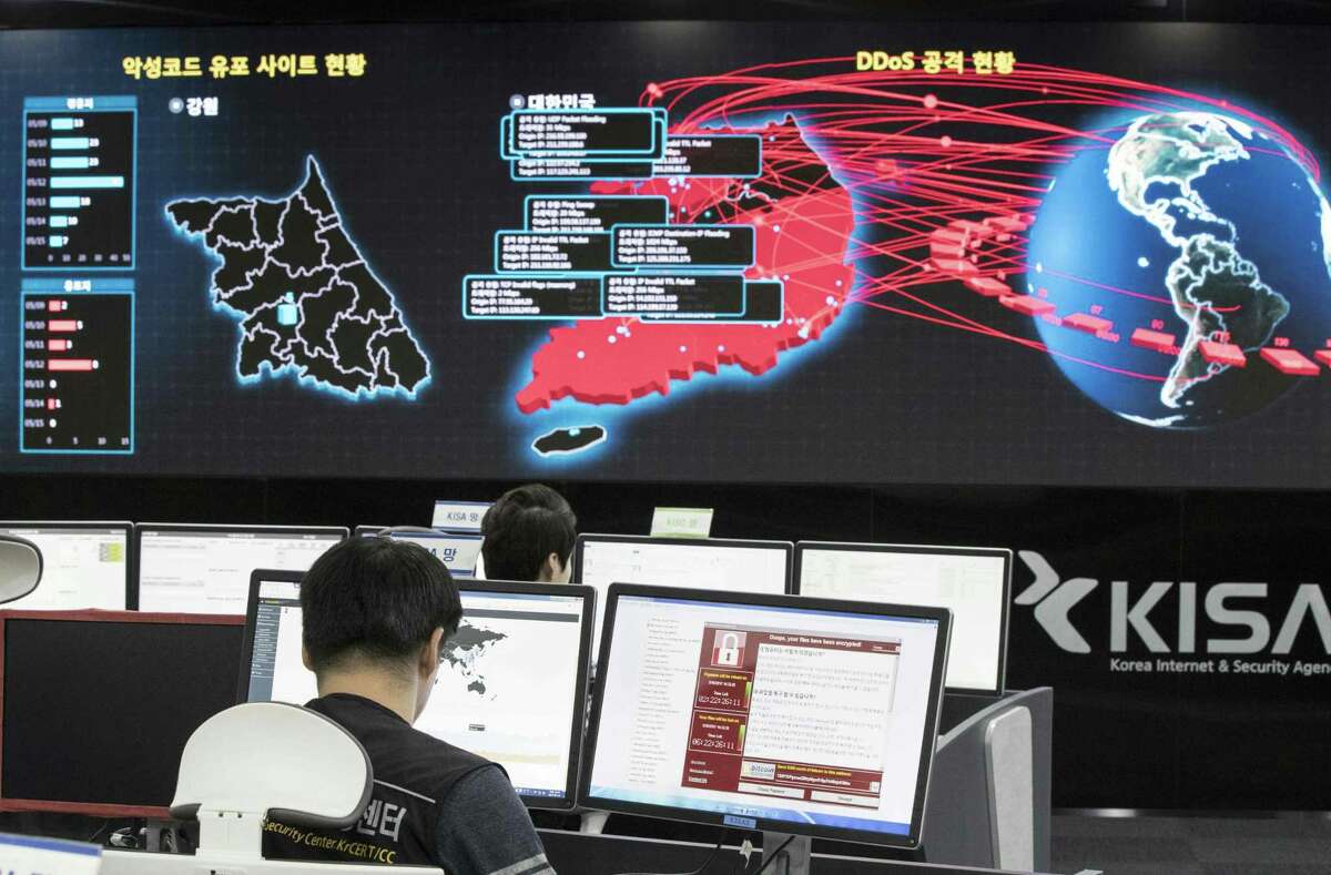 Korea Internet and Security Agency staffers in Seoul monitor the spread of ransomware cyberattacks.