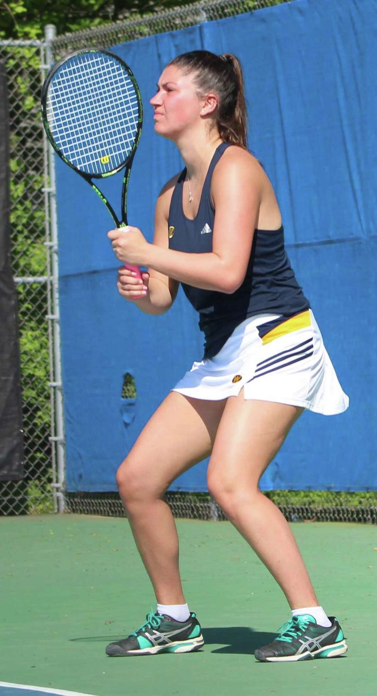 Weston's Cayla Koch won in straight sets at No. 1 singles to help lead the Trojans to victory over Barlow in the South-West Conference girls tennis team final at Weston High School May 17, 2017.