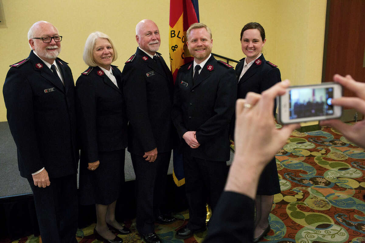 THEOPHIL SYSLO | For the Daily News Salvation Army officers Lt. Col. John Turner, Retired Lt. Col. June McLaren, Lt. Col. Mickey McLaren, Corps Officer Brian Goodwill and Captain Katrina Goodwill pose for a portrait after a luncheon celebrating 75 years (1942-2017) at the Holiday Inn on Wednesday.