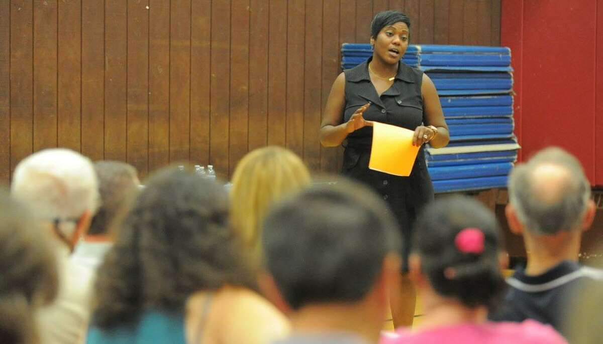 FILE — Edith Presley, Principal of Julia A. Stark School speaks about the schools D.E.A.R. (Drop Everything and Readaloud) program during the quarterly Glenbrook Neighborhood Association meeting at the Glenbrook Community Center in Stamford, Conn. on Wednesday, Sept. 21, 2016.