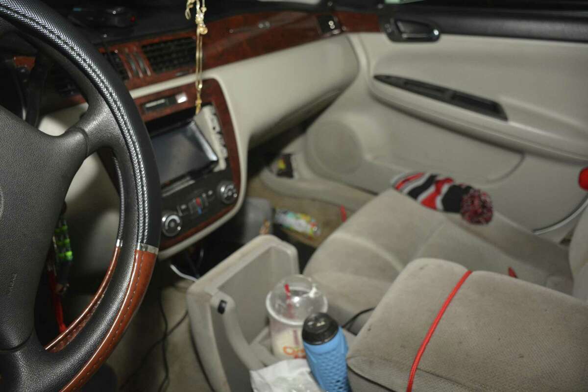 The inside of Calin Devonte Roquemore's white Chevrolet Impala, which an officer tried to pull over one night in Beckville. Roquemore refused to stop, leading the officer on a short vehicle and then foot chase. Roquemore was shot after falling while running. Source: Panola County.