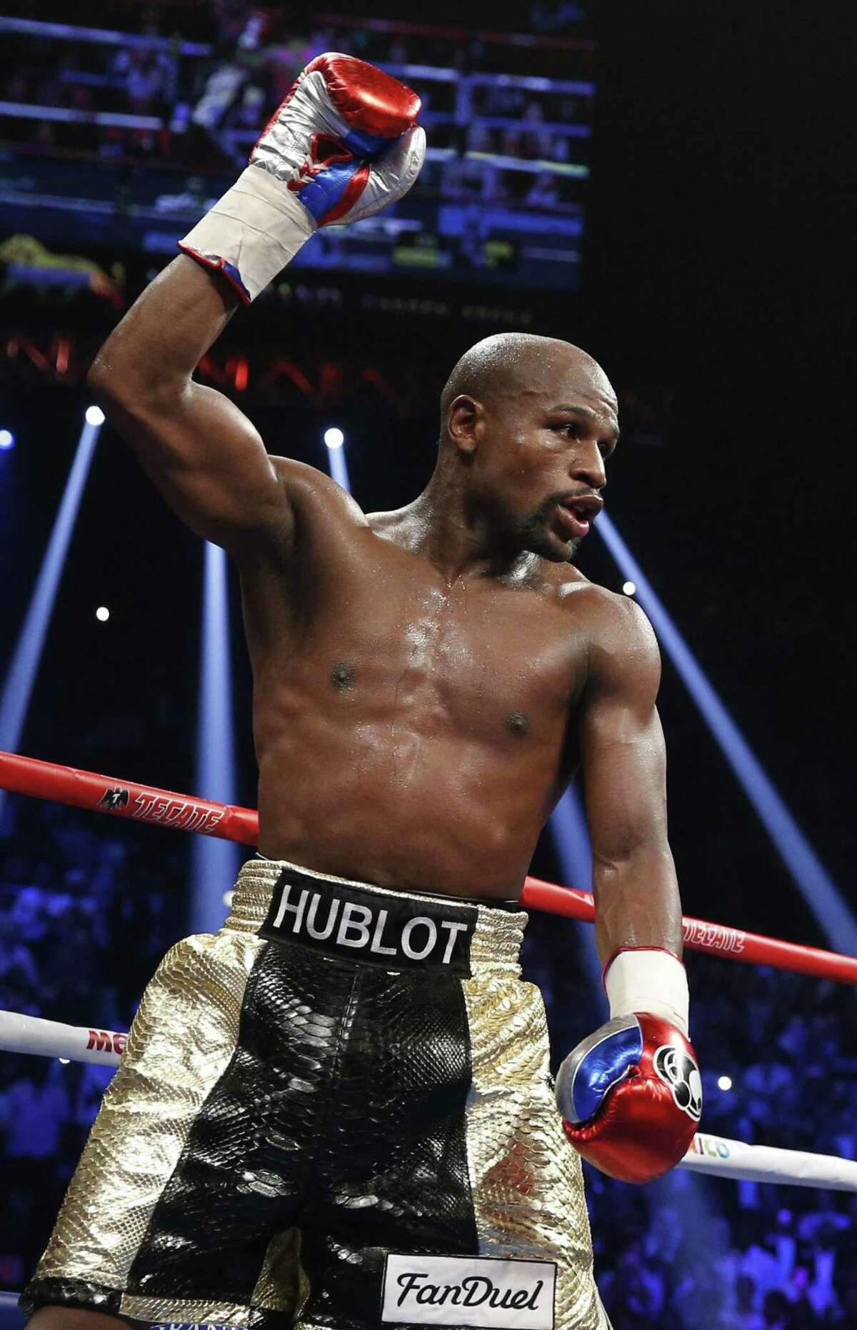 Floyd Mayweather Jr. celebrates during his welterweight title fight against Manny Pacquiao, in Las Vegas on May 2, 2015. Conor McGregor has come to an agreement with UFC that has moved a proposed fight with Mayweather Jr. closer to reality.