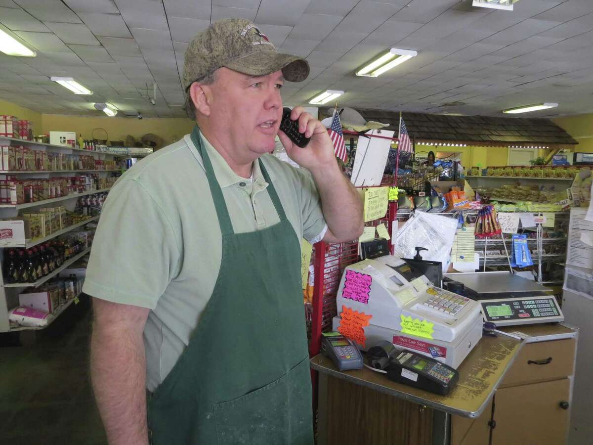 John Sheffield, a grocer in Ingram, contends city officials there have overstepped their authority by trying to force him to tie his business into a new sewer main. Contending they have that legal authority, city officials cited him after he ignored notices telling him to take action by last February.