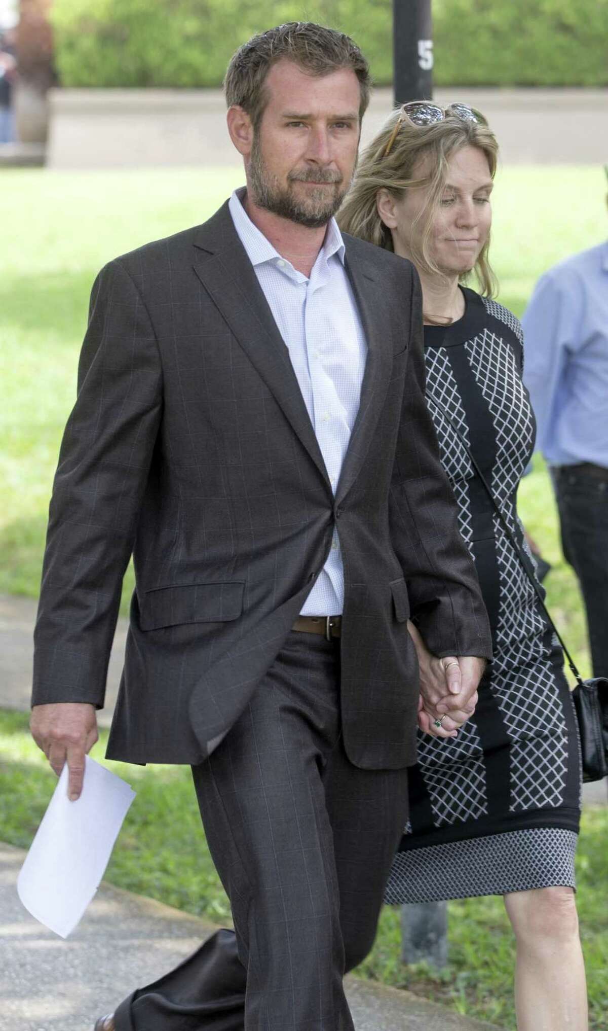 Lawyers for Lubbock businessman Vernon C. Farthing, state Sen. Carlos Uresti’s co-defendant, requested a more than five month delay in the trial. The two men will now stand trial beginning Oct. 22. Farthing is seen with his wife, Aurora, leaving the San Antonio federal courthouse in May.