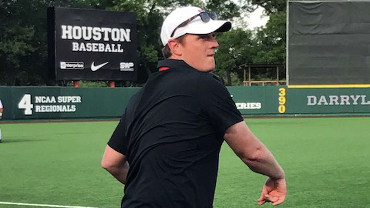 UH football coach Major Applewhite throws the first pitch before the Cougars' game against Cincinnati on Thursday, May 18, 2017.