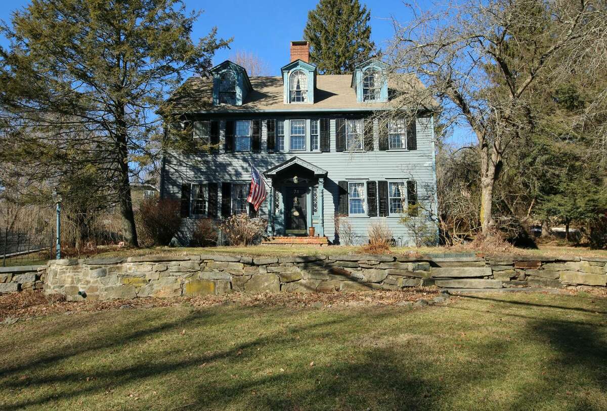 Blue house on Main Street on the market