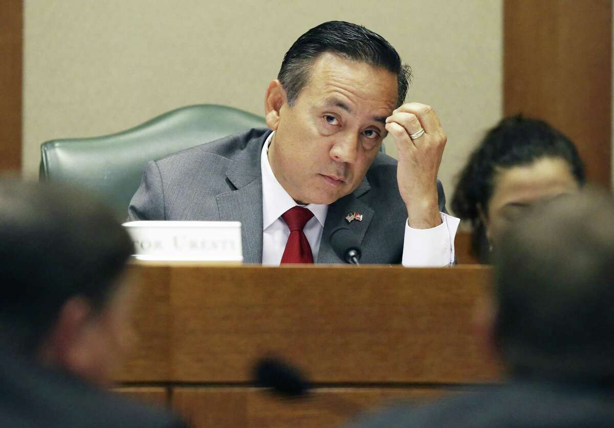 State Sen. Carlos Uresti, is fighting to keep out certain information from his criminal fraud trial, including a Securities and Exchange Commission investigation into the collapse of a San Antonio frac-sand company. Ureseti had multiple roles with the company. Uresti is pictured at the Texas Capitol in May.