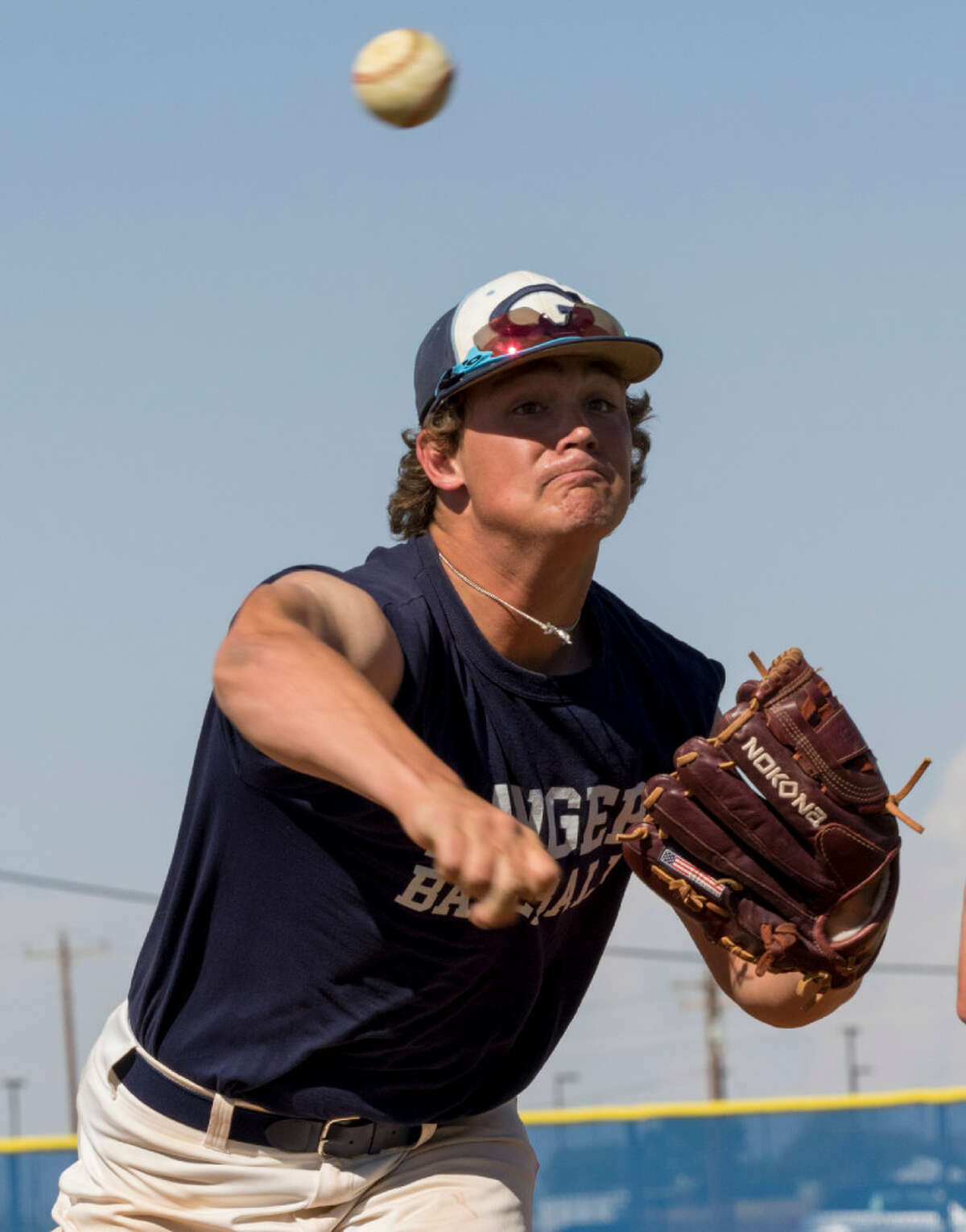 Love doing stuff with the community': Brandon Miller tosses first pitch at  Knights game