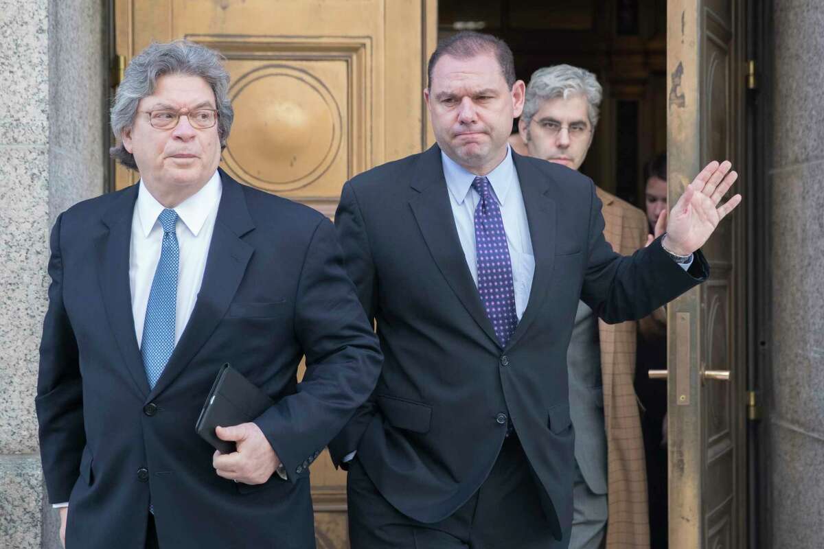 Joseph Percoco, center, leaves Federal court with his attorneys Barry Bohrer, left, and Michael Yaeger, Thursday, Dec. 1, 2016, in New York. Percoco, a former top advisor to New York Gov. Andrew Cuomo, pleaded not guilty in a federal corruption case. A November indictment alleges bid-rigging and bribery. (AP Photo/Mary Altaffer) ORG XMIT: NYMA101