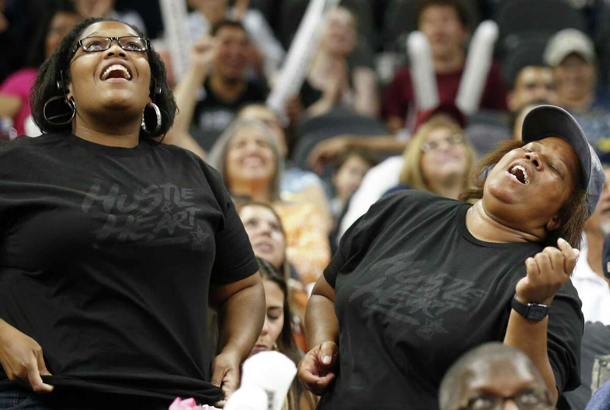 Fans sing during the San Antonio Stars and Phoenix Mercury game Friday May 19, 2017 at the AT&T Center.