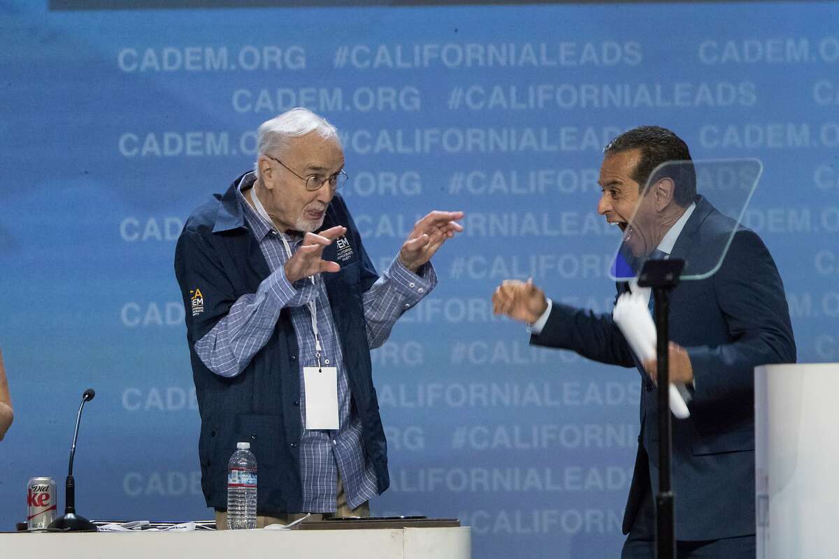 John Burton jokes with former Los Angeles Mayor Antonio Villaraigosa after his speech at the California Democrats 2017 State Convention on Saturday, May 20, 2017 in Sacramento, CA.