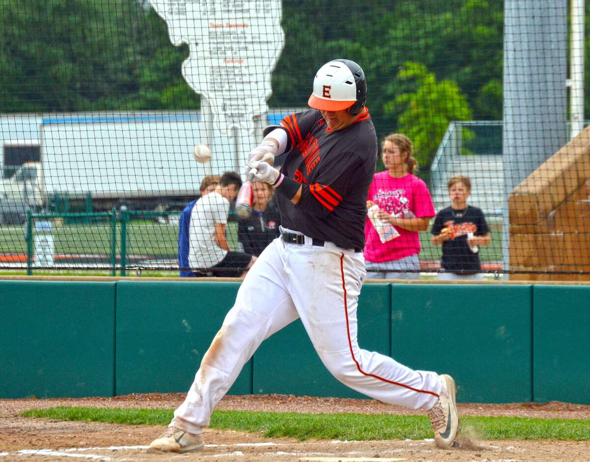 Edwardsville freshman Drake Westcott hits a solo home run in the first inning of Saturday’s game at Tom Pile Field.
