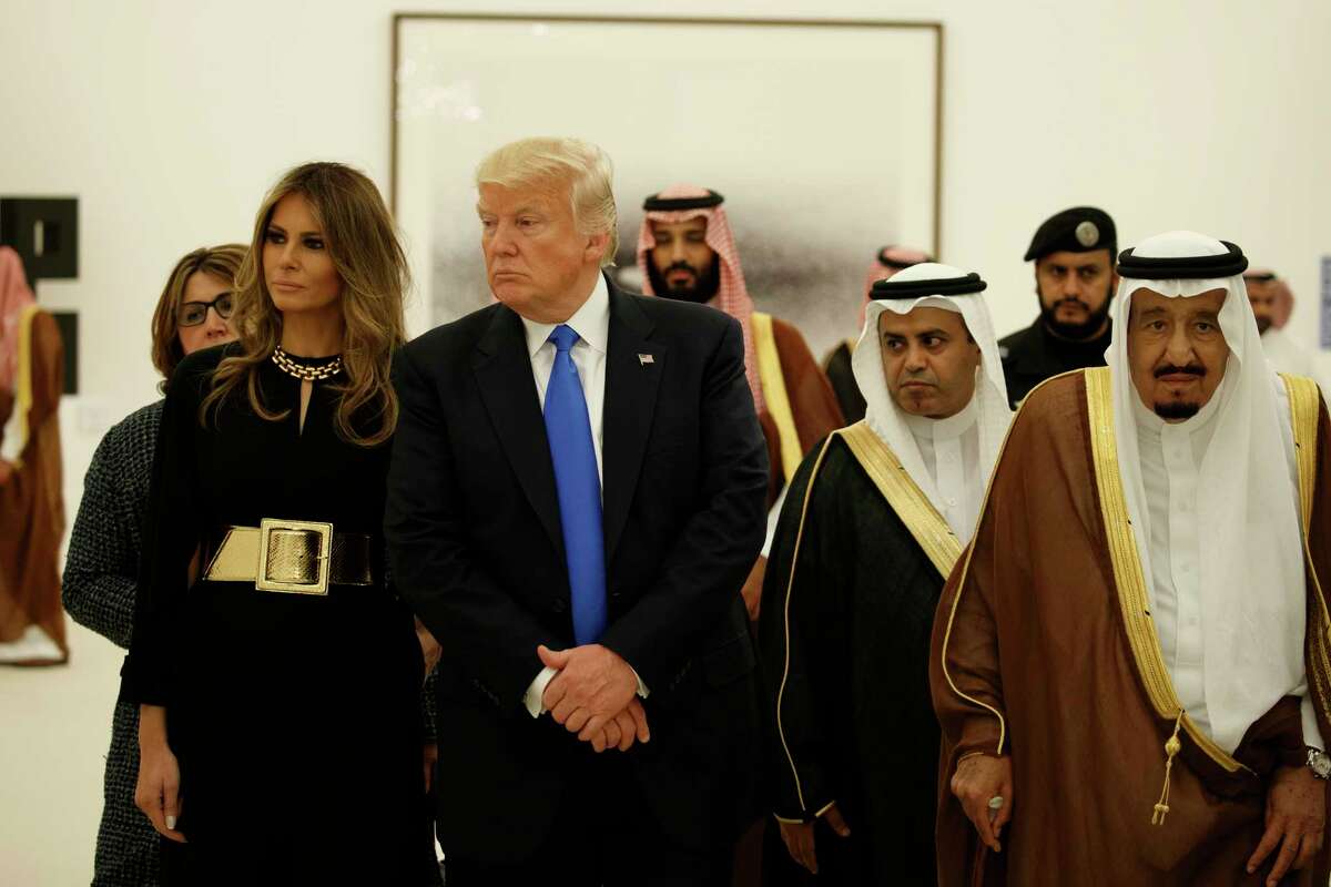 President Donald Trump and first lady Melania Trump visit an art exhibit with Saudi King Salam at the Royal Court Palace, Saturday, May 20, 2017, in Riyadh. (AP Photo/Evan Vucci)