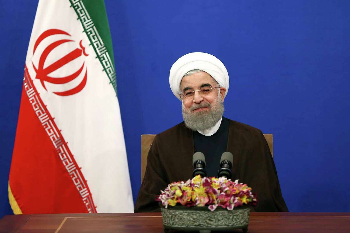Iranian President Hassan Rouhani attends a televised speech after he won the election, in Tehran, Iran, Saturday, May 20, 2017. Rouhani says that the message of Friday's election that gave him another four-year term is one of Iran living in peace and friendship with the world. (AP Photo/Ebrahim Noroozi)