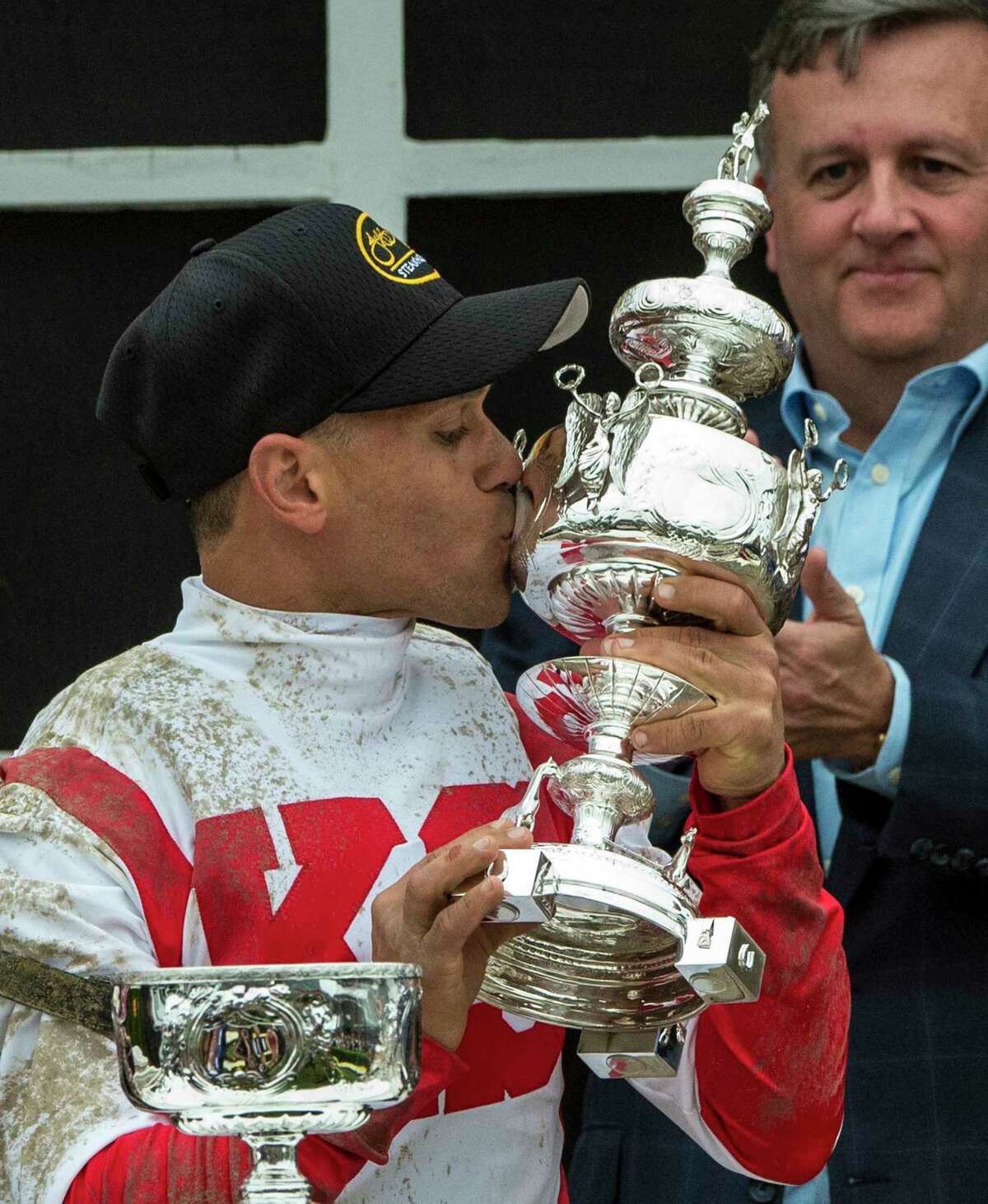 Cloud Computing's jockey Javier Castellano kisses the winner's trophy aloft after winning the 142nd running of the Preakness Stakes Saturday May 20, 2017 at Pimlico Race Course in Baltimore, MD (Skip Dickstein/Times Union)