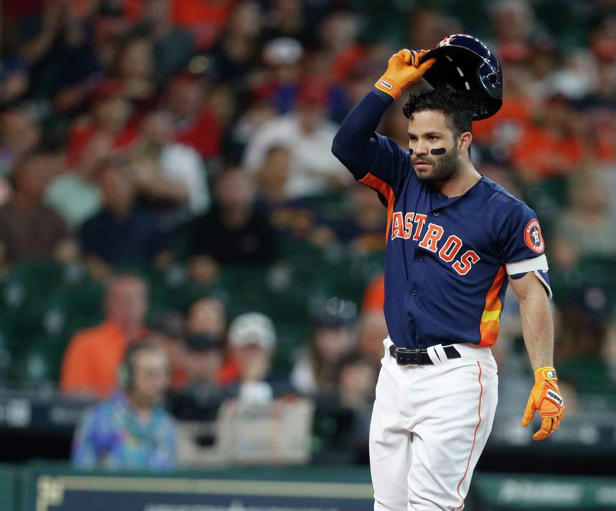 Houston Astros second baseman Jose Altuve (27) reacts after striking out during the first inning of an MLB baseball game at Minute Maid Park, Sunday, May 21, 2017.