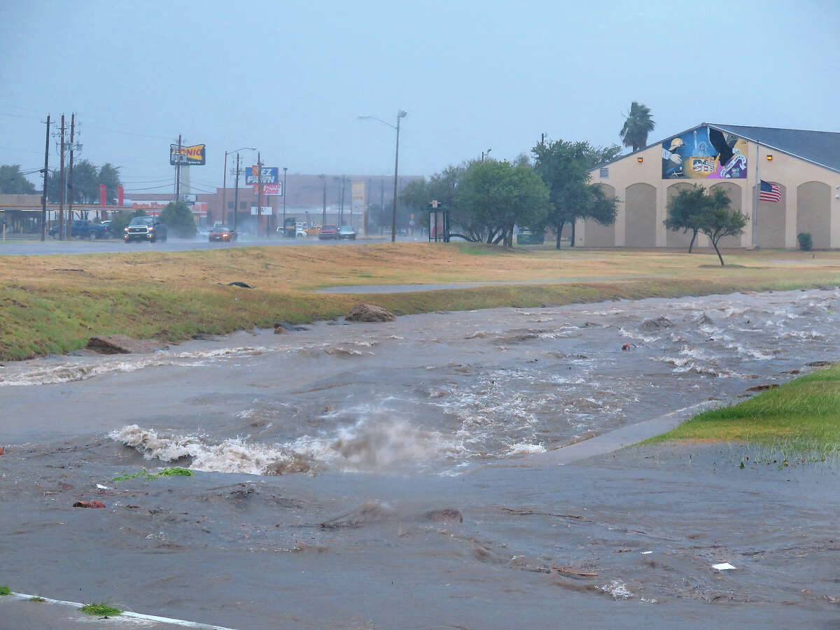 Zacate Creek off McPherson Road crested as a severe storm swept through the area Sunday, May 21, 2017. The storm brought heavy rain, hail and strong wind gusts.