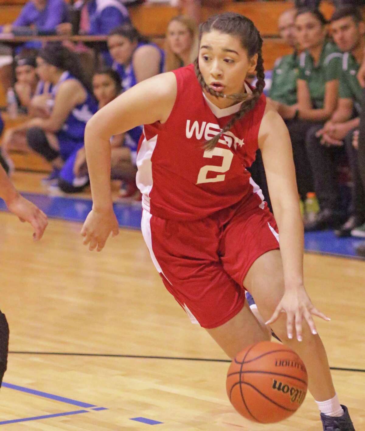 Alexander's Dannia González had a game-high 16 points but her West team lost 65-59 in the 16th annual Bosom Buddies All-Star girls’ basketball game at St. Augustine.