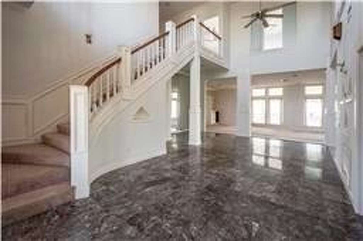 Gallery Tiki Island home with giant deck overlooking Galveston’s West