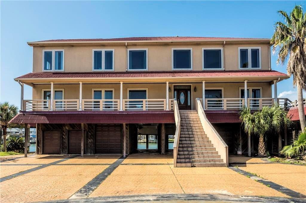 Peer inside this Tiki Island home with giant deck overlooking Galveston