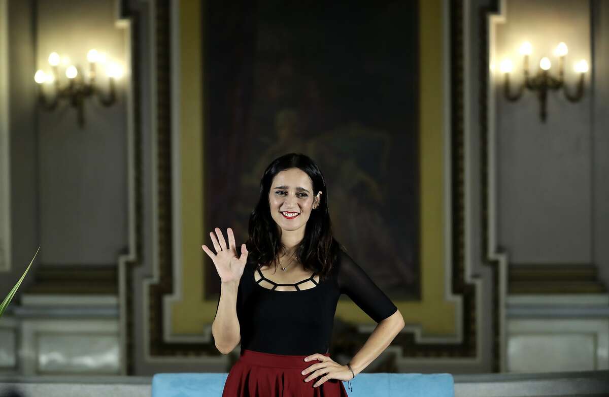 Mexican singer Julieta Venegas waves at the end of a press conference at the Teatro Metropolitan to promote her upcoming concert featuring her album, "Algo Sucede" in Mexico City, Tuesday, Aug. 30, 2016. (AP Photo/Eduardo Verdugo)