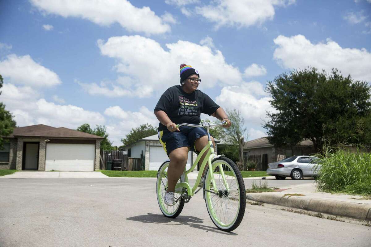 Adam Snow, who is transgender, rides his bike in San Antonio, Texas on August 24, 2017. He was told that, before he will be allowed to take testosterone, he must lose some weight , so he started riding his bike regularly.