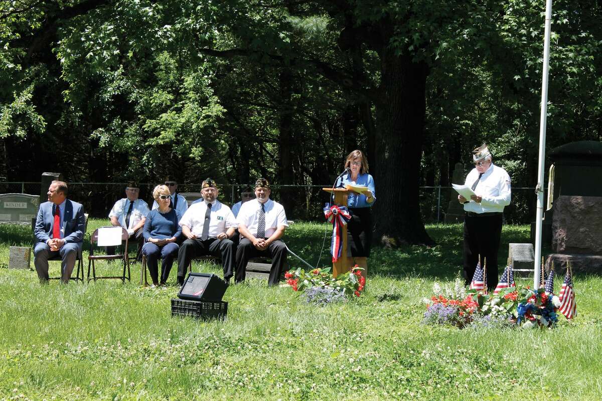 State Representative Katie Stuart speaks Sunday during the annual Oaklawn Cemetery Memorial Day Ceremony in Glen Carbon. Oaklawn conducts its service each year on the weekend prior to Memorial Day and is attended by members of Glen Carbon VFW Post 2222 and American Legion Post 435. Glen Carbon Mayor Rob Jackstadt also spoke at the event.