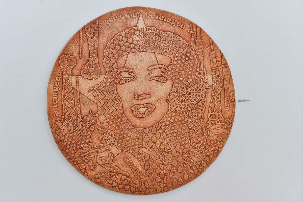 One of the pieces from the exhibit of Cuban artist Adrian Rumbaut from the series “ Symbols, Supports, and Steps” depicts his mash-up of Marilyn Monroe and Che Guevara.