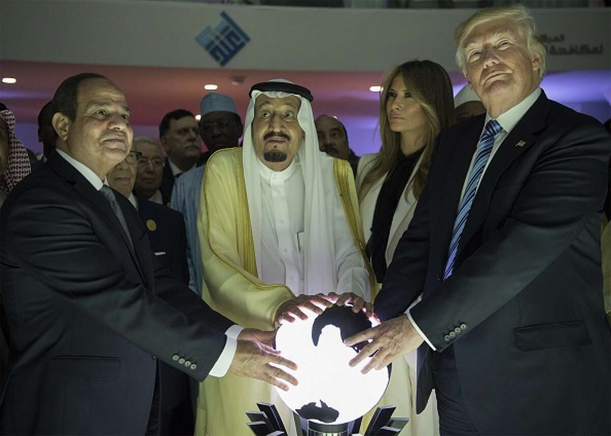 >>> BEST Twitter posts about President Trump touching an orb. US President Donald Trump, US First lady Melania Trump (2nd R), Saudi Arabia's King Salman bin Abdulaziz al-Saud (2nd L) and Egyptian President Abdel Fattah el-Sisi (L) put their hands on an illuminated globe during the inauguration ceremony of the Global Center for Combating Extremist Ideology in Riyadh, Saudi Arabia on May 21, 2017. (Photo by Bandar Algaloud / Saudi Royal Council / Handout/Anadolu Agency/Getty Images)  