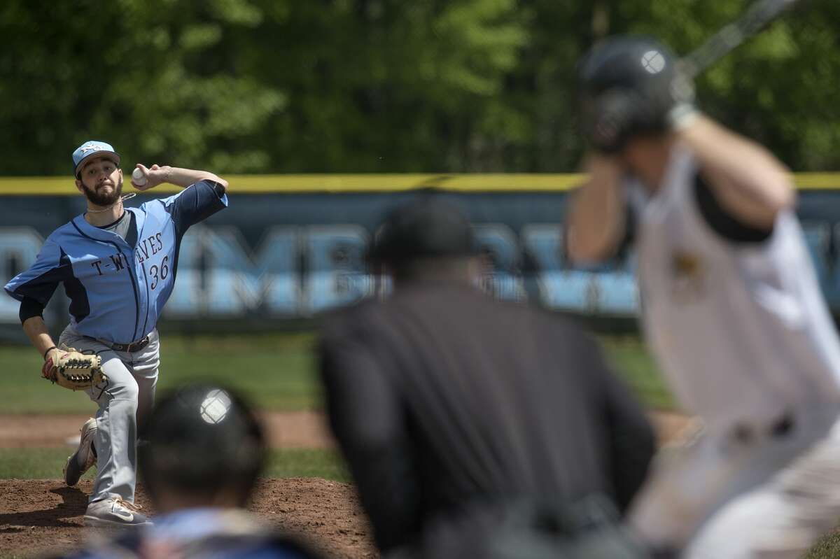 Northwood University's Tyler Jandron pitches to Quincy University's batter Dominic Miles in the first inning of the NCAA DII regional championship game Monday afternoon at Gerace Stadium. Quincy defeated Northwood 4-3.