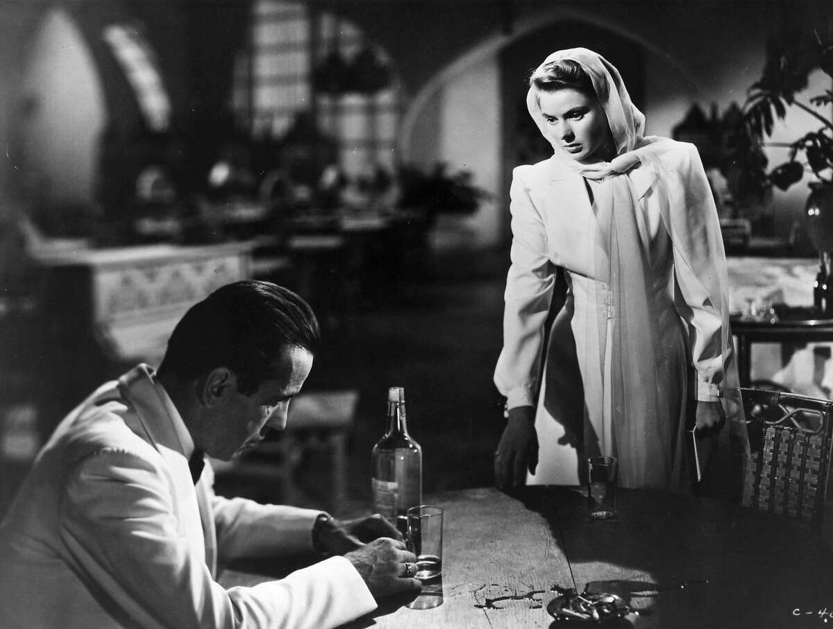 Humphrey Bogart (1899 - 1957) and Ingrid Bergman (1915 - 1982) in a scene from the film 'Casablanca', directed by Michael Curtiz for Warner Brothers. Original Publication: Picture Post - 8514 - Ingrid Bergman Story - pub. 1943 (Photo by Picture Post/Getty Images)