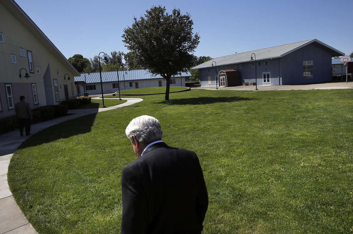 Michael Miller, Director of San Joaquin County�s Human Services Agency walks through the grounds during a Chronicle tour of Mary Graham Children's Shelter April 21, 2017 in French Camp, Calif.
