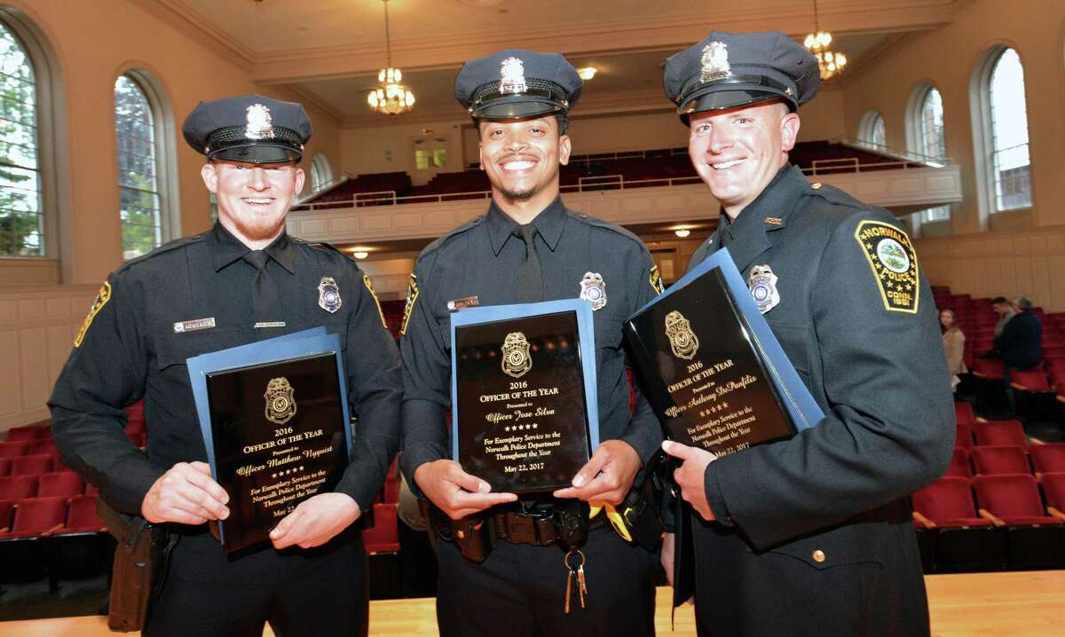 Norwalk Police Officers Mathew Nyquist, Jose Silva and Anthony DePanfilis are the 2016 Officers of the Year. They were presented their plaques during the Norwalk Department of Police Service’s annual awards ceremony at City Hall on Monday.