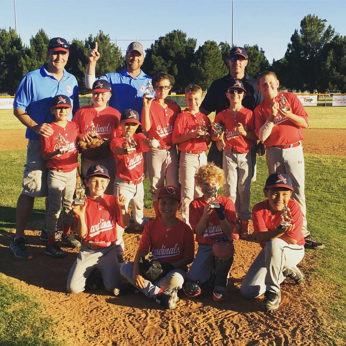 The Cardinals are, top row (left to right), Coaches Shan Moon, Bo Garrison and Justin Ham. Middle row (left to right) Noah Lopez, Ryder Matthies, Julian Navarrette, Soren Jackson, Carson Ham, Davis Ham and Zach Kelly, From row (left to right) Mitchell Moon, Aiden Herrera, Wade Moss and Phillip Contreras