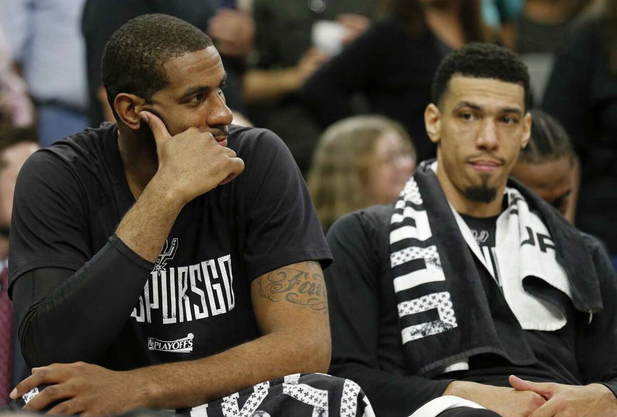 Spurs forward LaMarcus Aldridge (left) and guard Danny Green sit dejected on the bench late in Game 4 of the Western Conference finals against the Golden State Warriors on May 22, 2017 at the AT&T Center.