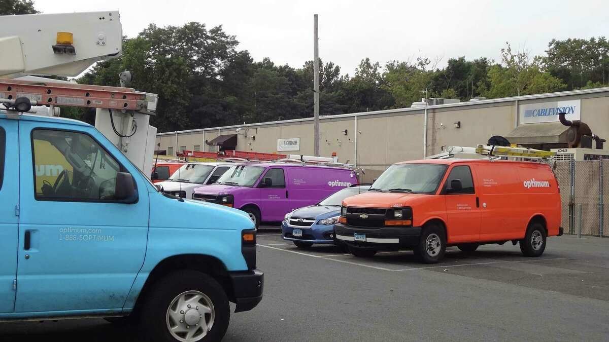 Optimum trucks at a Cablevision dispatch center in Stamford, Conn., with Cablevision acquired in June 2016 by Altice.