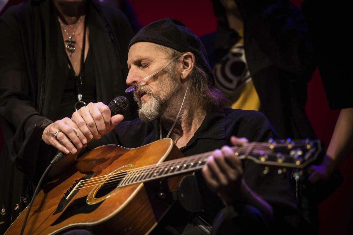Jimmy LaFave performs Thursday during a concert honoring his life and music at the Paramount Theater in Austin. He died Sunday after a fight with cancer.