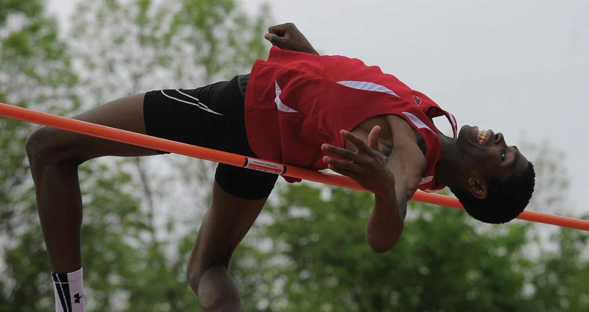 Greenwich Safir Scott attempts to set a new Connecticut State High Jump record by clearing 7-00.5 during the FCIAC boys track and field championship at Ridgefield High School on May 23, 2017. Scott won the event with a jump of 6-08.