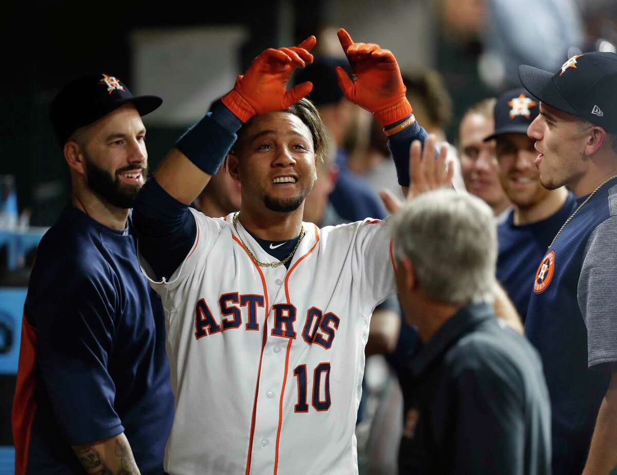 Houston Astros first baseman Yuli Gurriel (10) celebrates in the dugout after his home run during the second inning of an MLB baseball game at Minute Maid Park, Tuesday, May 23, 2017. ( Karen Warren / Houston Chronicle )